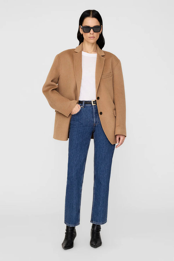 Oversized camel blazer with straight-leg jeans